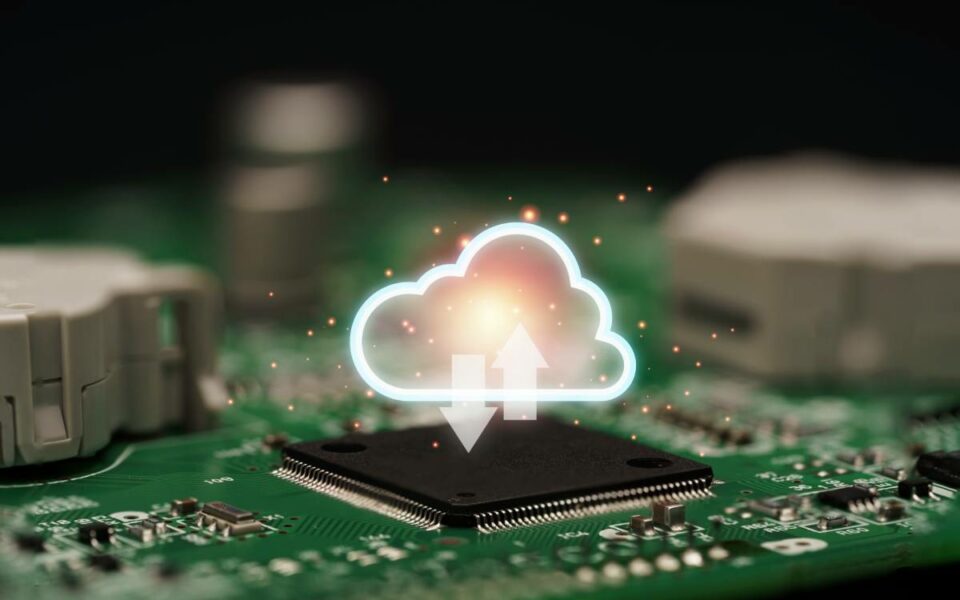 Cloud computing concept showing glowing cloud icon over electronic circuit board, symbolizing FinOps and GreenOps in sustainable IT